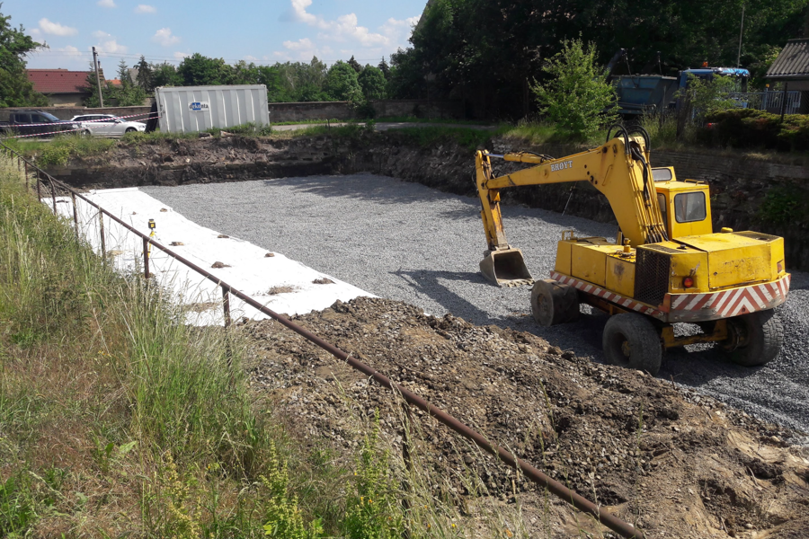 An excavator revitalizing a wetland