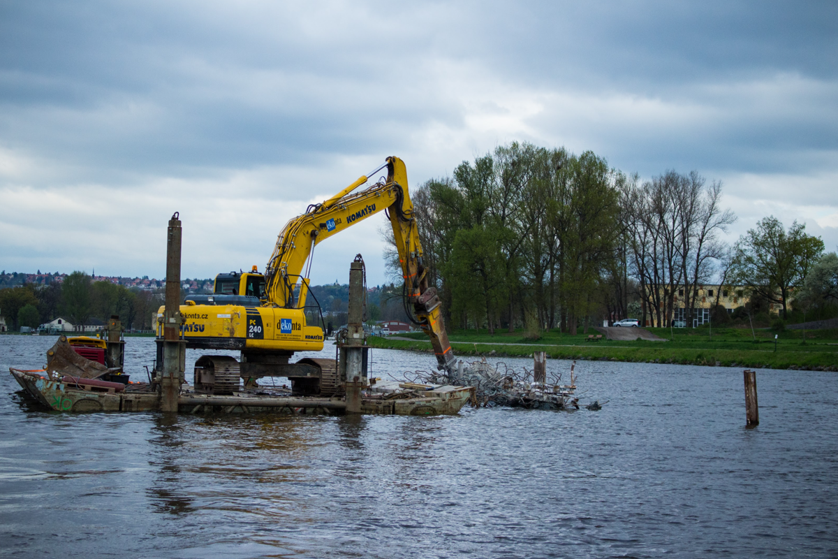 Heavy machinery working in a riverbed